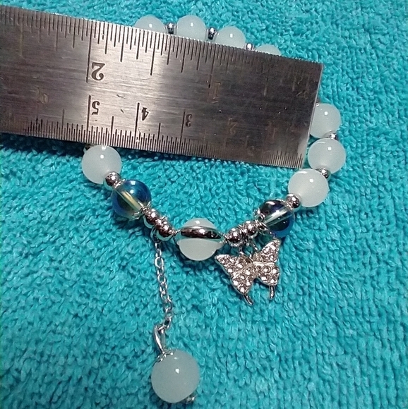 Silvertone white beads crystal butterfly aurora beads stretch bracelet - Picture 3 of 4